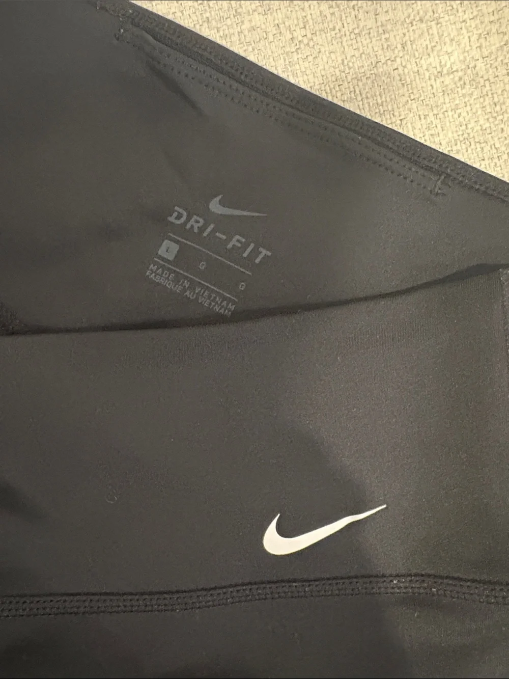 Nike Women’s Black Mid-Rise Bike Shorts with White Swoosh